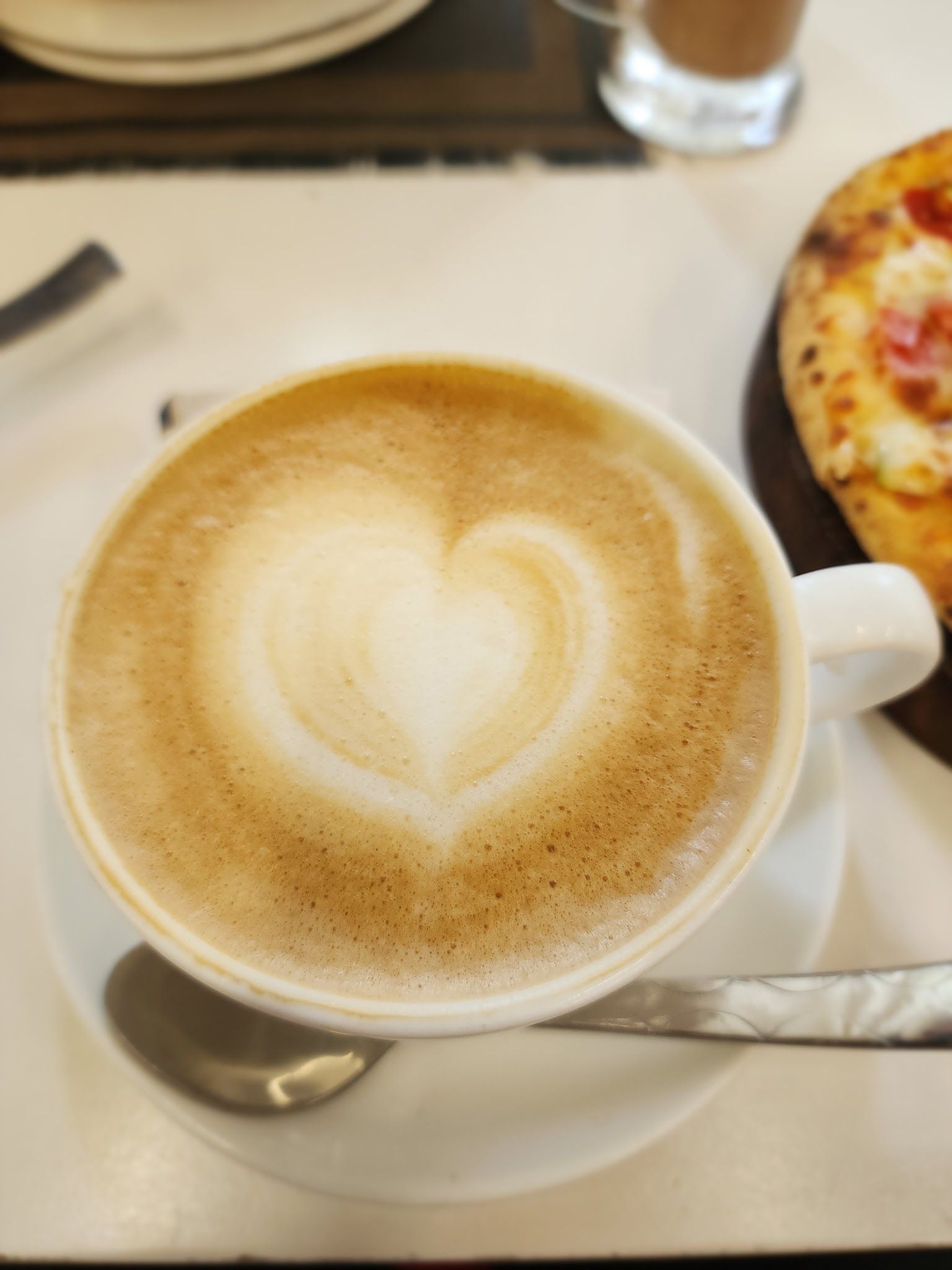 A cappuccino with heart latte art