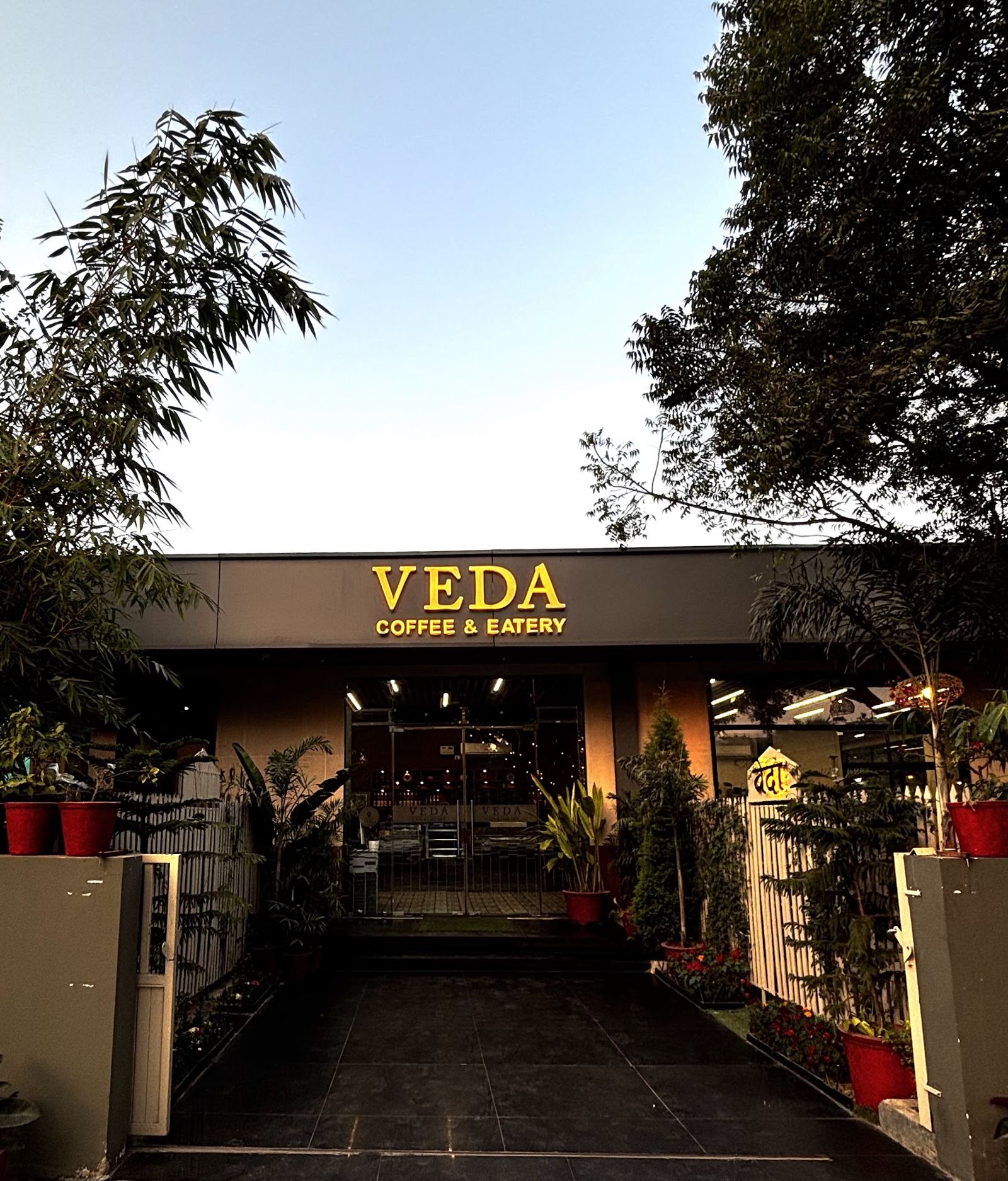 The path to the café entrance at dusk